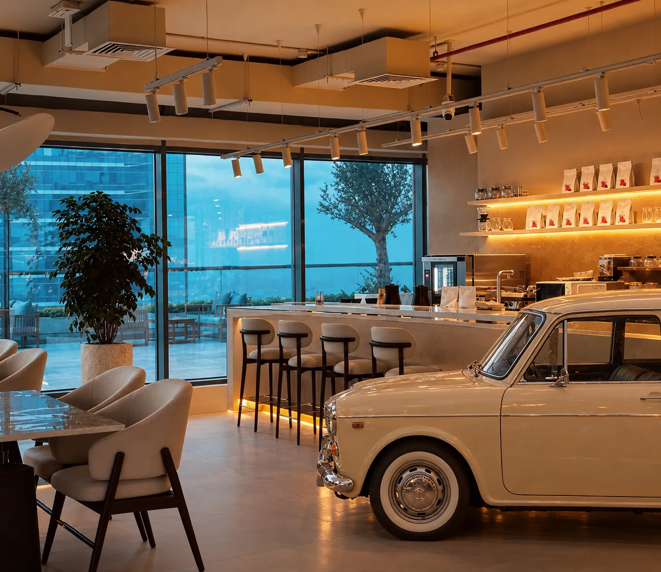Baitna Café coffee bar with a vintage car parked inside